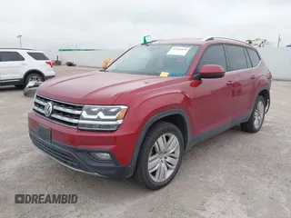 2019 Volkswagen Atlas SE with VIN 1V2WR2CA4KC606661, listed as a IAAI auction lot 42581054 with 89,079 mi miles and . Bid and sale history available at DreamBid. Image 2.