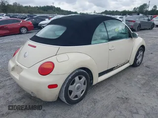2004 Volkswagen Beetle with VIN 3VWCM21Y64M306721, listed as a IAAI auction lot 41611494 with 183,434 mi miles and . Bid and sale history available at DreamBid. Image 4.