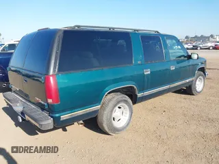 1996 GMC Suburban with VIN 1GDEC16R5TJ742543, listed as a IAAI auction lot 41910103 with 159,469 mi miles and . Bid and sale history available at DreamBid. Image 4.