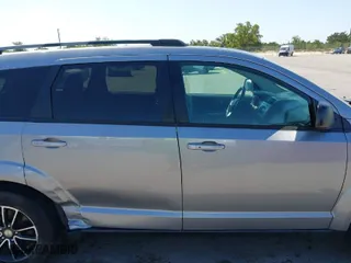 2017 Dodge Journey SE with VIN 3C4PDCAB1HT573511, listed as a IAAI auction lot 41984865 with 128,721 mi miles. Bid and sale history available at carsss.com. Image 17.