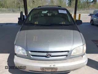 1999 Toyota Sienna LE with VIN 4T3ZF13C4XU166786, listed as a IAAI auction lot 42057995 with 316,259 mi miles. Bid and sale history available at carsss.com. Image 12.