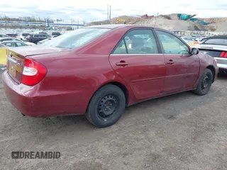 2004 Toyota Camry LE with VIN 4T1BE32K84U307551, listed as a IAAI auction lot 42054571 with 115,513 mi miles. Bid and sale history available at carsss.com. Image 4.