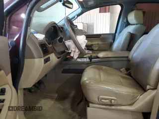 2014 Nissan Armada Platinum z VIN 5N1BA0NFXEN610416, wystawiony jako Copart lot #74033474 z przebiegiem 151 302 mil mil oraz Szkoda całkowita • Salvage title. Historia ofert i sprzedaży dostępna na DreamBid. Obrazek 7.