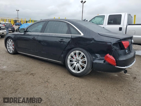 2013 Audi A8 3.0L with VIN WAURGAFD2DN013552, listed as a Copart auction lot 57822075 with 146,315 mi miles and Salvage title. Bid and sale history available at DreamBid. Image 2.