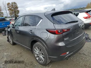 2023 Mazda CX-5 Signature with VIN JM3KFBXY3P0136316, listed as a Copart auction lot 76843514 with 15,932 mi miles and Salvage Title. Bid and sale history available at carsss.com. Image 2.