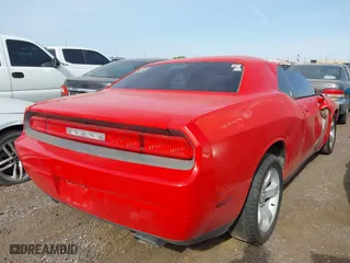 2014 Dodge Challenger Rallye Redline with VIN 2C3CDYAG5EH242723, listed as a IAAI auction lot 41793463 with 165,255 mi miles. Bid and sale history available at carsss.com. Image 4.