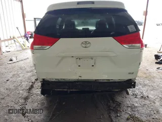 2014 Toyota Sienna XLE with VIN 5TDYK3DC6ES444121, listed as a IAAI auction lot 42110190 with 240,366 mi miles and . Bid and sale history available at DreamBid. Image 6.