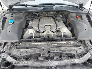 2016 Porsche Cayenne Turbo z VIN WP1AC2A20GLA85193, wystawiony jako IAAI lot #42170440 z przebiegiem 95 999 mil mil oraz . Historia ofert i sprzedaży dostępna na DreamBid. Obrazek 10.
