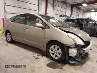 2006 Toyota Prius z VIN JTDKB20U967536950, wystawiony jako IAAI lot #42148763 z przebiegiem 113 847 mil mil oraz . Historia ofert i sprzedaży dostępna na DreamBid. Obrazek 1.