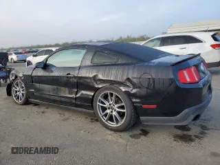 2012 Ford Mustang GT Premium with VIN 1ZVBP8CF6C5271586, listed as a Copart auction lot 83878894 with 101,016 mi miles and Salvage Title. Bid and sale history available at DreamBid. Image 2.
