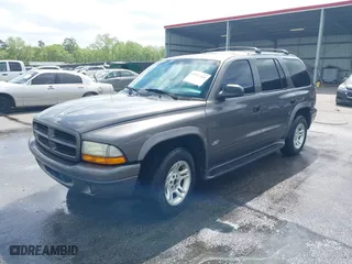 2002 Dodge Durango Sport with VIN 1B4HR38N32F213399, listed as a IAAI auction lot 41927441 with 288,016 mi miles. Bid and sale history available at carsss.com. Image 2.