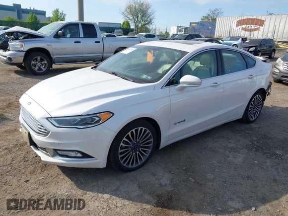 2017 Ford Fusion Hybrid Titanium с VIN 3FA6P0RU7HR148191, выставлен на аукционе IAAI как лот 42167708 с пробегом 72 708 миль миль и . История ставок и продаж доступна на DreamBid. Изображение 2.