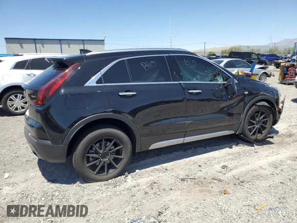 2021 Cadillac XT4 FWD Premium Luxury с VIN 1GYFZCR4XMF004996, выставлен на аукционе Copart как лот 61270355 с пробегом Не указан миль и Списание • Salvage title. История ставок и продаж доступна на DreamBid. Изображение 3.
