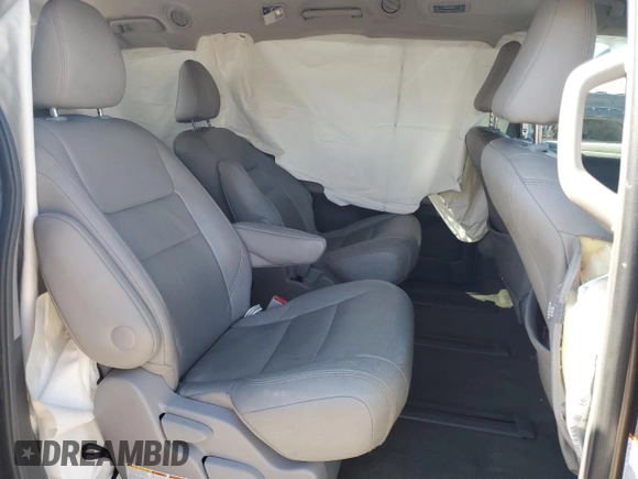 2015 Toyota Sienna Limited z VIN 5TDDK3DC4FS106412, wystawiony jako Copart lot #55531975 z przebiegiem 179 363 mil mil oraz Szkoda całkowita • Salvage title. Historia ofert i sprzedaży dostępna na DreamBid. Obrazek 11.