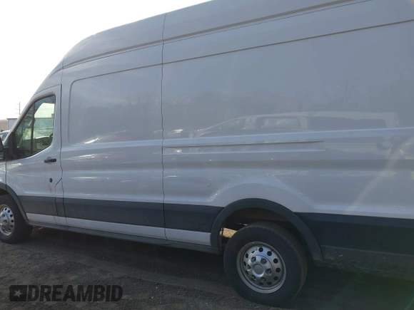 2023 Ford Transit Cargo with VIN 1FTBR3U88PKB01785, listed as a IAAI auction lot 41681093 with 47,672 mi miles and . Bid and sale history available at DreamBid. Image 14.