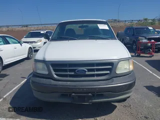 2003 Ford F-150 XL with VIN 2FTPF17Z03CA86883, listed as a IAAI auction lot 42169915 with Not provided miles and . Bid and sale history available at DreamBid. Image 11.