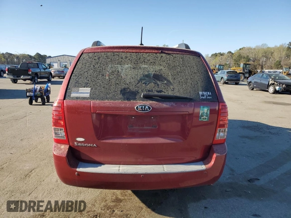 2011 Kia Sedona LX with VIN KNDMG4C73B6369139, listed as a Copart auction lot 52794875 with 176,512 mi miles and Salvage Title. Bid and sale history available at carsss.com. Image 6.