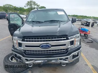 2018 Ford F-150 XL with VIN 1FTEW1E5XJKC37082, listed as a IAAI auction lot 42335721 with 167,401 mi miles and . Bid and sale history available at DreamBid. Image 11.