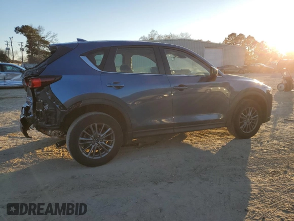 2021 Mazda CX-5 Sport with VIN JM3KFABMXM1313156, listed as a Copart auction lot 41365285 with 42,828 mi miles and Salvage Title. Bid and sale history available at carsss.com. Image 3.
