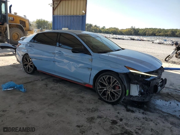 2022 Hyundai Elantra N with VIN KMHLW4AK3NU007233, listed as a Copart auction lot 77675104 with 21,950 mi miles and Salvage Title. Bid and sale history available at carsss.com. Image 4.
