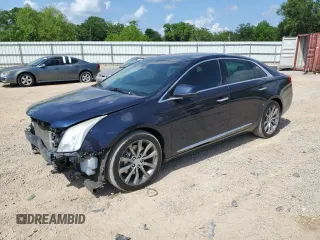 2015 Cadillac XTS Luxury z VIN 2G61M5S32F9169354, wystawiony jako Copart lot #54887215 z przebiegiem 138 795 mil mil oraz Szkoda całkowita • Salvage title. Historia ofert i sprzedaży dostępna na DreamBid. Obrazek 1.