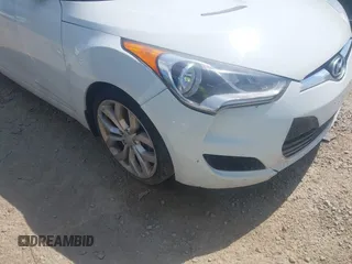 2013 Hyundai Veloster w/Black Int with VIN KMHTC6AD2DU131983, listed as a IAAI auction lot 42671646 with 131,731 mi miles and . Bid and sale history available at DreamBid. Image 6.
