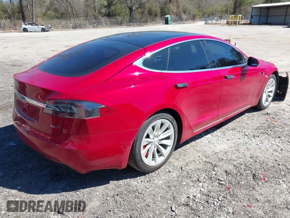 2018 Tesla Model S 75D with VIN 5YJSA1E2XJF295777, listed as a IAAI auction lot 41694540 with 70,428 mi miles and . Bid and sale history available at DreamBid. Image 4.