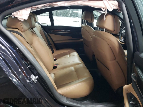 2015 BMW 7 Series 750i xDrive with VIN WBAYB6C53FD225423, listed as a Copart auction lot 78827414 with 69,780 mi miles and Salvage Title. Bid and sale history available at carsss.com. Image 10.
