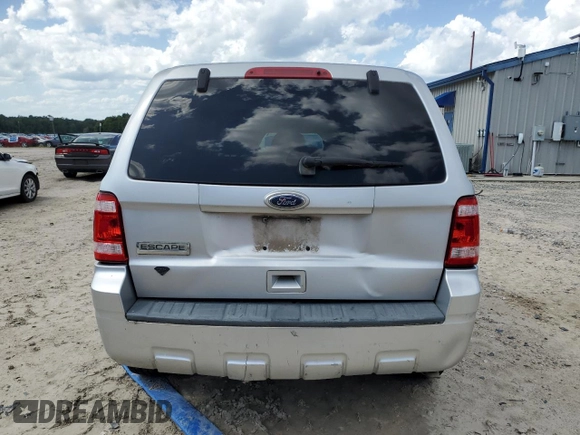 2010 Ford Escape XLS z VIN 1FMCU0C77AKC97179, wystawiony jako Copart lot #64385055 z przebiegiem 164 525 mil mil oraz Czysty tytuł • Clean title. Historia ofert i sprzedaży dostępna na DreamBid. Obrazek 6.