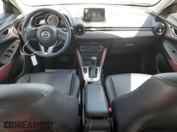 2016 Mazda CX-3 Touring with VIN JM1DKDC71G0130858, listed as a Copart auction lot 52047765 with 115,299 mi miles and Salvage Title. Bid and sale history available at carsss.com. Image 8.