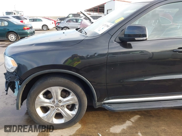 2014 Dodge Durango Limited z VIN 1C4RDJDG5EC593711, wystawiony jako IAAI lot #41717501 z przebiegiem 151 107 mil mil oraz . Historia ofert i sprzedaży dostępna na DreamBid. Obrazek 21.