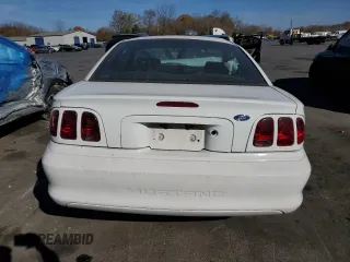 1997 Ford Mustang with VIN 1FALP4041VF194986, listed as a Copart auction lot 78841404 with 118,936 mi miles and Salvage Title. Bid and sale history available at carsss.com. Image 6.