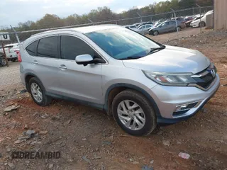 2015 Honda CR-V EX-L with VIN 2HKRM3H77FH524093, listed as a IAAI auction lot 41912203 with 157,328 mi miles. Bid and sale history available at carsss.com. Image 1.