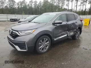 2021 Honda CR-V Touring with VIN 2HKRW1H96MH420465, listed as a Copart auction lot 86885384 with 61,699 mi miles and Salvage Title. Bid and sale history available at carsss.com. Image 1.