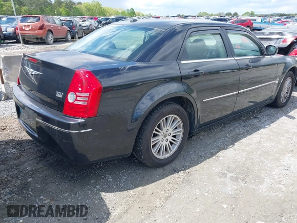 2009 Chrysler 300 Touring with VIN 2C3KA53V99H584082, listed as a IAAI auction lot 42026860 with 147,558 mi miles. Bid and sale history available at carsss.com. Image 4.