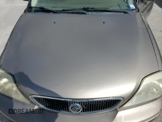 2003 Mercury Sable LS Premium z VIN 1MEFM59S03A606329, wystawiony jako Copart lot #79331624 z przebiegiem 152 059 mil mil oraz Nie do naprawy. Historia ofert i sprzedaży dostępna na DreamBid. Obrazek 11.
