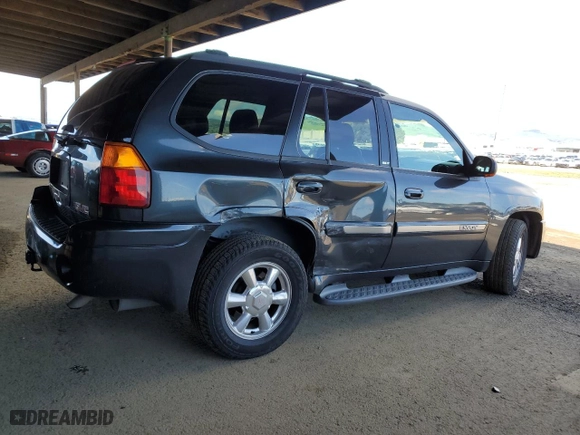 2003 GMC Envoy SLT with VIN 1GKDS13S532314786, listed as a Copart auction lot 49187965 with 186,821 mi miles and Salvage Title. Bid and sale history available at carsss.com. Image 3.