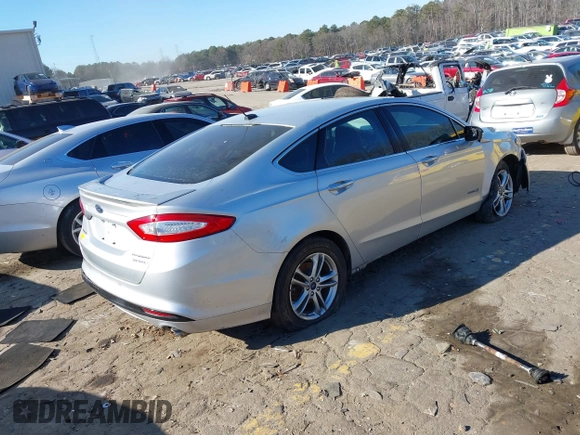2016 Ford Fusion Titanium Hybrid with VIN 3FA6P0RU7GR364573, listed as a IAAI auction lot 41298298 with 189,900 mi miles. Bid and sale history available at carsss.com. Image 4.