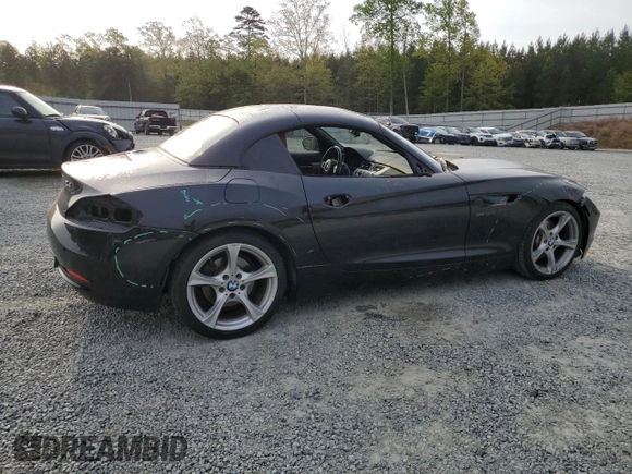 2016 BMW Z4 sDrive28i with VIN WBALL5C50GP557837, listed as a Copart auction lot 51038615 with 59,878 mi miles and Salvage Title. Bid and sale history available at carsss.com. Image 3.