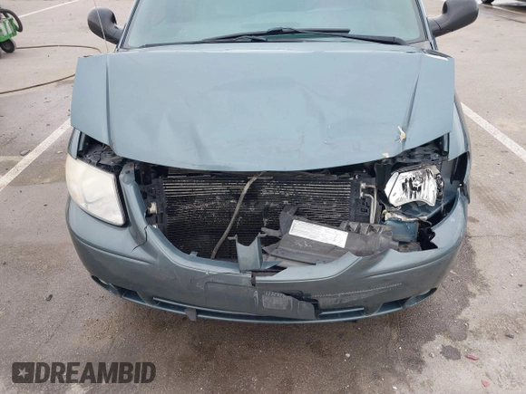 2005 Dodge Caravan SXT with VIN 2D4GP44LX5R115310, listed as a IAAI auction lot 41668454 with 115,784 mi miles and . Bid and sale history available at DreamBid. Image 6.