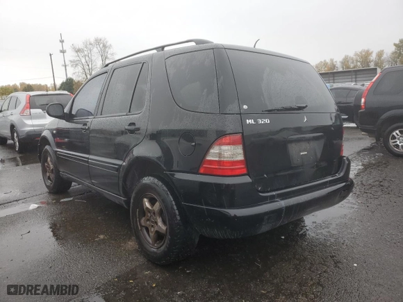 2001 Mercedes-Benz M-Class with VIN 4JGAB54E51A273024, listed as a Copart auction lot 80327264 with 211,120 mi miles and Salvage Title. Bid and sale history available at carsss.com. Image 2.