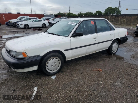 1991 Toyota Camry z VIN JT2SV21E2M3435406, wystawiony jako Copart lot #74958494 z przebiegiem 127 580 mil mil oraz Szkoda całkowita • Salvage title. Historia ofert i sprzedaży dostępna na DreamBid. Obrazek 1.