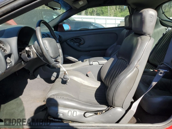 1998 Pontiac Firebird Formula z VIN 2G2FV22G4W2217094, wystawiony jako Copart lot #80755694 z przebiegiem Nie podano mil oraz Szkoda całkowita • Salvage title. Historia ofert i sprzedaży dostępna na DreamBid. Obrazek 7.