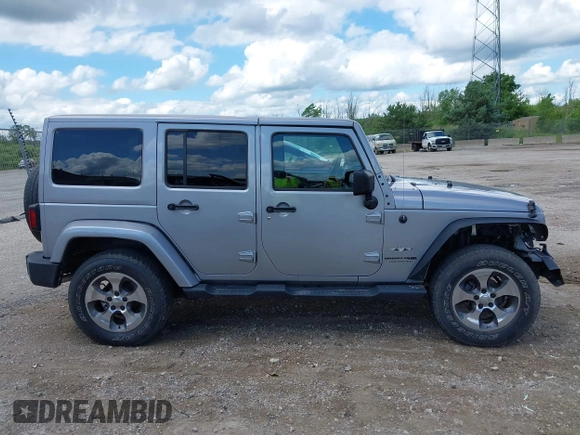 2018 Jeep Wrangler Unlimited Sahara with VIN 1C4BJWEGXJL806832, listed as a IAAI auction lot 42605892 with 90,535 mi miles and . Bid and sale history available at DreamBid. Image 13.