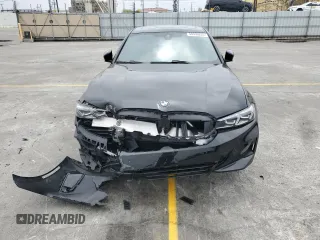 2023 BMW 3 Series 330i z VIN 3MW69FF05P8D51932, wystawiony jako Copart lot #54539205 z przebiegiem Nie podano mil oraz Szkoda całkowita • Salvage title. Historia ofert i sprzedaży dostępna na DreamBid. Obrazek 5.