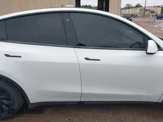 2021 Tesla Model Y Standard Range with VIN 5YJYGDED8MF114076, listed as a IAAI auction lot 41567295 with 150,133 mi miles and . Bid and sale history available at DreamBid. Image 12.