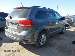 2013 Dodge Journey SXT with VIN 3C4PDCBG0DT502787, listed as a IAAI auction lot 41743639 with 54,823 mi miles. Bid and sale history available at carsss.com. Image 4.