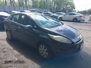 2013 Ford Fiesta SE z VIN 3FADP4BJ0DM175870, wystawiony jako IAAI lot #42187368 z przebiegiem 194 009 mil mil oraz . Historia ofert i sprzedaży dostępna na DreamBid. Obrazek 1.