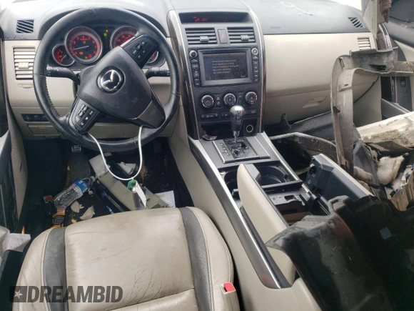 2011 Mazda CX-9 Grand Touring with VIN JM3TB2DA0B0320628, listed as a Copart auction lot 56310725 with 119,068 mi miles and Salvage title. Bid and sale history available at DreamBid. Image 8.