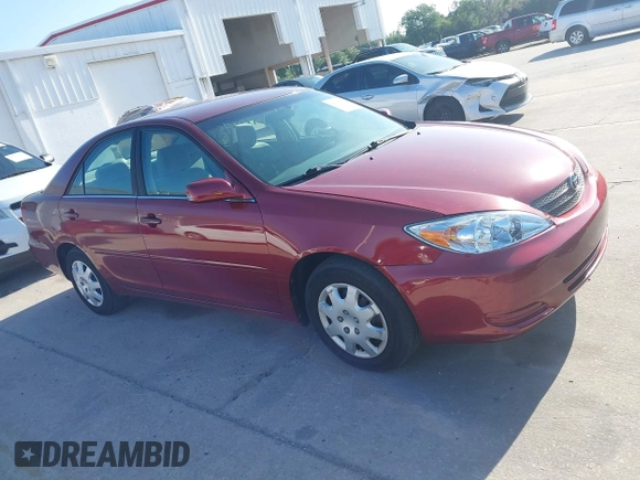 2004 Toyota Camry LE with VIN 4T1BE32KX4U272768, listed as a IAAI auction lot 42006421 with 204,386 mi miles. Bid and sale history available at carsss.com. Image 13.